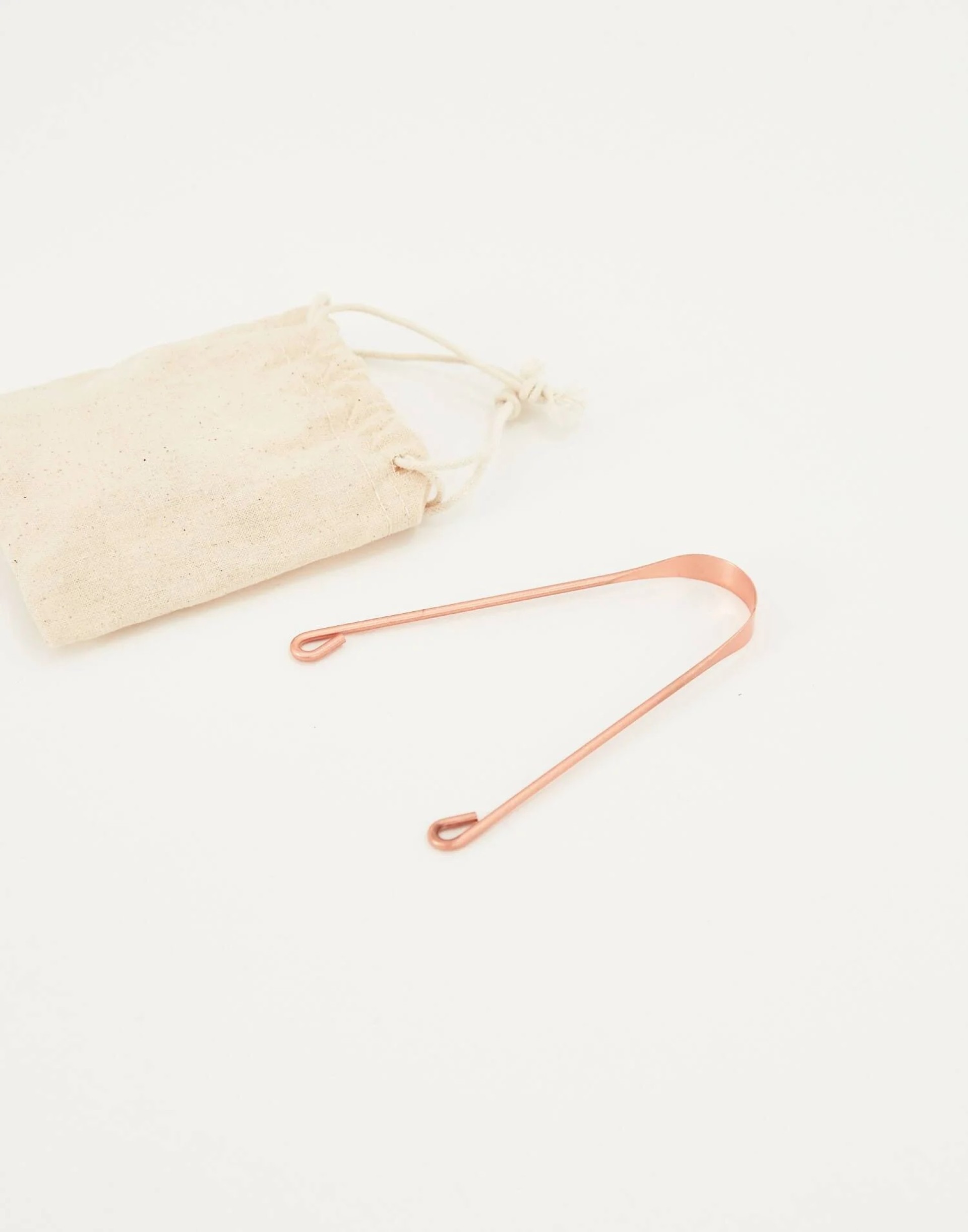 Limpador de lingua em cobre