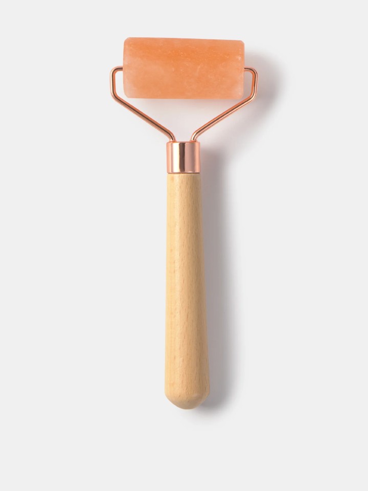 Massajador facial de sal do Himalaia