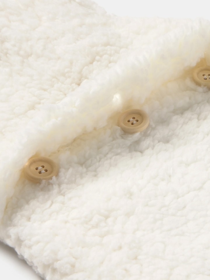 Bolsa de agua quente em pele de carneiro