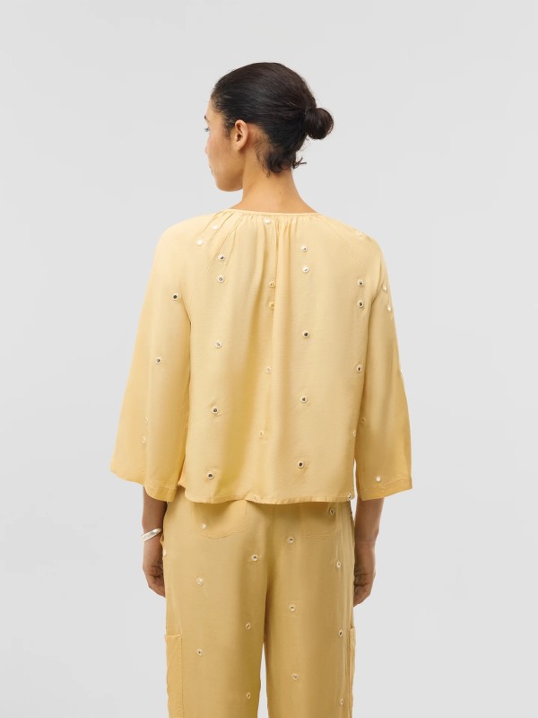 Blusa com espelhos Blusa com espelhos