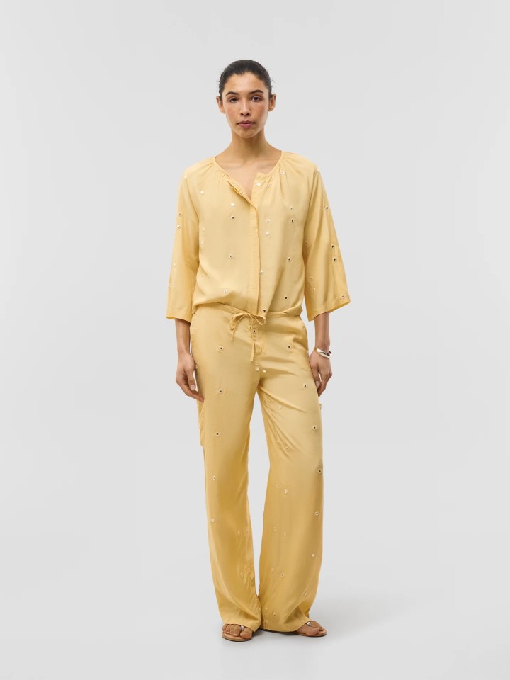 Blusa com espelhos